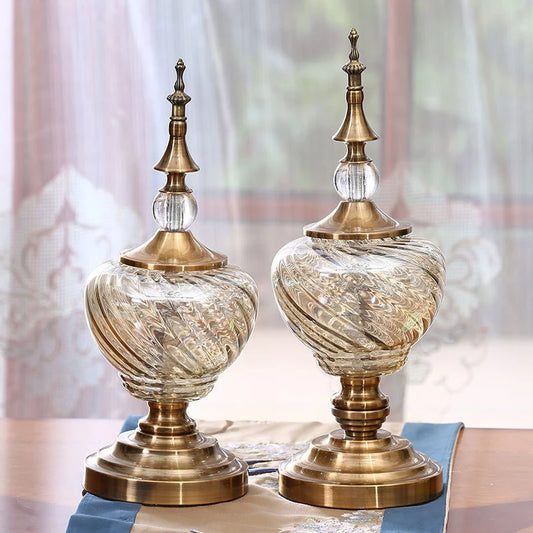 Ornate glass decorative jars with gold-tone finials; sizes sold separately